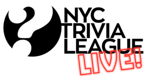 Trivia night answer sheets and pens on a wooden table.