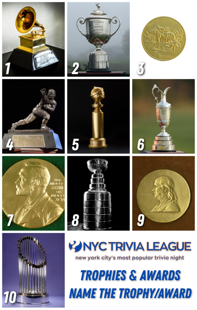 Trivia night answer sheets and pens on a wooden table.